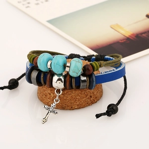Men's vintage layered leather bracelet featuring turquoise beads and a metal cross pendant