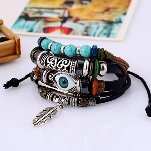 Bohemian multi-layer leather bracelet with evil eye beads and silver feather pendant