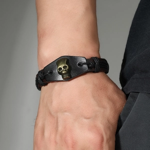 Bracelet en cuir tissé à la main pour hommes avec détail de crâne en bronze vintage