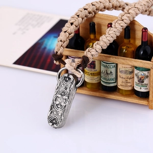Retro woven leather necklace with embossed rectangular pendant in vintage silver