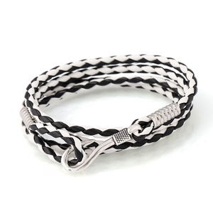 Multilayer braided PU leather nautical bracelet with silver fish hook clasp on white