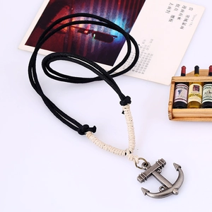 Retro alloy anchor pendant with twisted black rope cord shown at a 45-degree angle