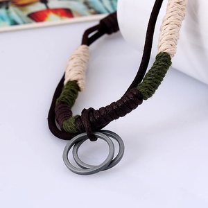 Vintage punk leather necklace with interlaced metal rings and handmade woven cord