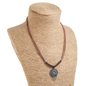 Vintage Hamsa Hand pendant on brown braided cord necklace for men, boho beach style accessory