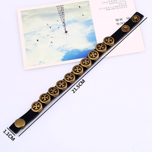 Punk vintage black leather bracelet featuring bronze alloy crosses and snap button closure