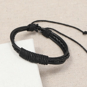 Bracelet rétro en cuir tressé noir pour hommes et femmes avec cordon réglable