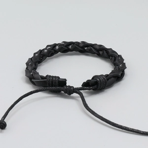 Retro woven genuine leather bracelet for men with adjustable black braided rope closure