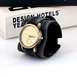 Punk style men's wide leather cuff watch with bronze metal case and rivet details