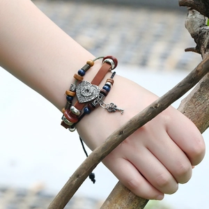 Handmade multilayer leather bracelet with vintage heart and key charms for men and women