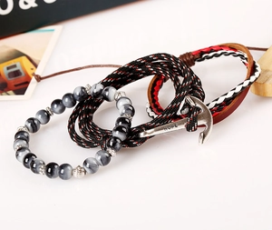 Retro nautical braided leather bracelet set with silver anchor pendant and hope engraving