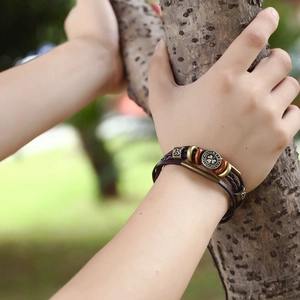 Retro multi-layer brown leather bracelet with bronze clover and Triquetra beads
