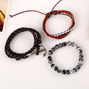 Three-piece nautical leather bracelet set with woven ropes and silver hope anchor pendant