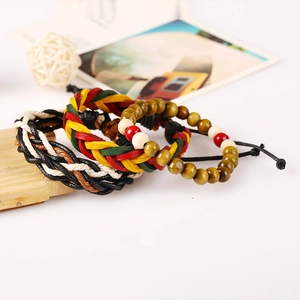 Three-piece Jamaica weave leather bracelet set with red, yellow, and green ethnic beads