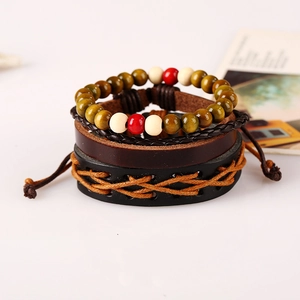 Retro multi-layer leather bracelet set with wooden beads and woven details on white backdrop