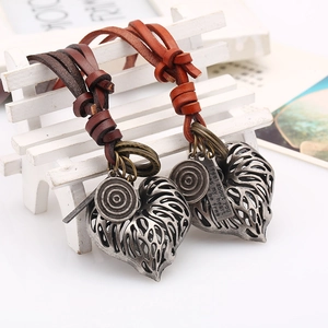 Vintage leather cord necklace with heart pendant and engraved metal charms for women