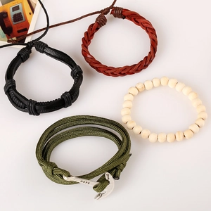 Navy style 4-piece set including braided leather bracelets and metal anchor charm