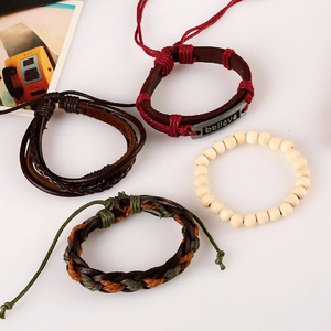 Retro multi-layer leather bracelet set with wooden beads and engraved 'Believe' metal plate
