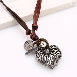 Vintage leather cord long necklace with heart pendant and retro metal charms