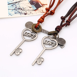 Vintage leather cord necklace with heart-shaped LOVE key pendant in antique silver finish