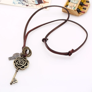 Vintage brown leather long necklace with bronze hollow rose key pendant and metal charm