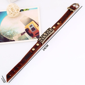 Vintage brown leather skull bracelet with bronze rivets and adjustable buckle clasp