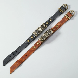 Punk style leather bracelets in black and brown with vintage metal floral accents
