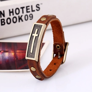 Vintage brown leather cross bracelet for men with bronze studs and adjustable buckle