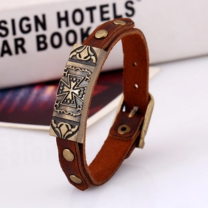 Vintage brown leather bracelet for men with bronze cross pattern and rivet details