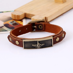 Bracelet vintage en cuir marron avec emblème Faravahar en bronze et boucle réglable