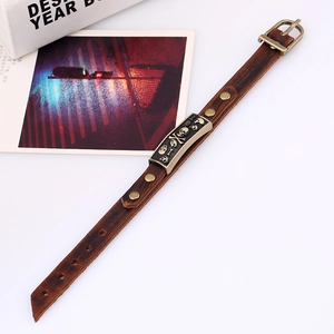 Retro punk genuine leather bracelet for men featuring a bronze skull plate and rivets