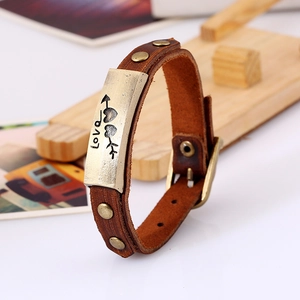 Vintage brown leather bracelet with Love engraved arrow plaque and bronze rivets