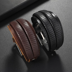 Adjustable wide leather biker bracelets in black and brown with punk rock textures
