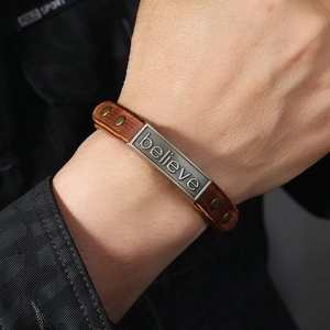 Vintage brown leather wristband with believe metal plate and studs for men