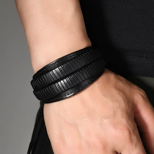 Men's punk rock wide leather bracelet with multi-layer braided texture and adjustable cuff