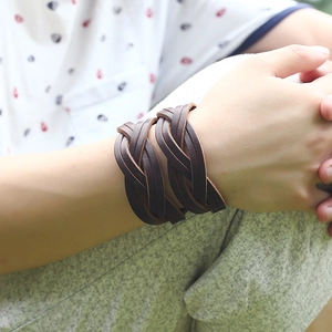 Men's retro punk dark brown multi-layer braided leather bracelet on wrist