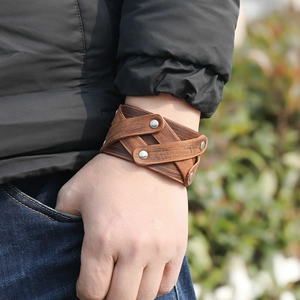 Retro multi-layer brown leather bracelet with silver studs in a vintage punk style