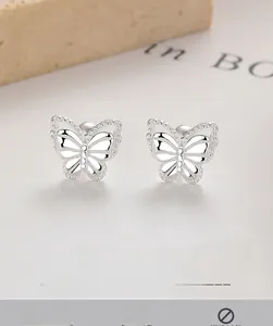 Detailed close-up of 925 sterling silver butterfly stud earrings with screw back design