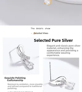 Macro detail of 925 sterling silver infinity drop earrings with sparkling zircon stones