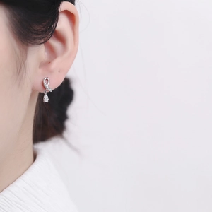 Elegant 925 sterling silver drop earrings with crossover ribbon design and zircon stones