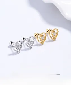 Detailed view of 925 silver heart star earrings with zircon inlay and screw back closure
