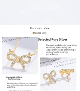 Détails macro du parure nœud en argent 925 doré avec incrustation de zircons étincelants