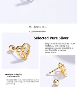 Detailed macro view of 925 sterling silver heart earrings with sparkling cubic zirconia