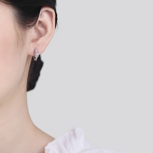 Sterling silver dragon hoop earrings for women featuring minimalist aesthetic and fine texture