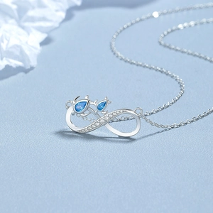 Elegant 925 sterling silver infinity necklace with blue teardrop stones and micro zircons