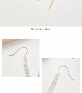Macro view of 925 sterling silver woven chain detail with polished metal finish