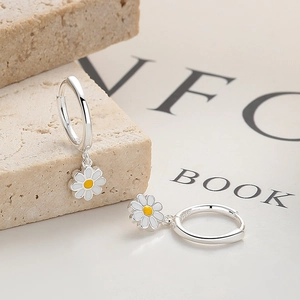 Elegant 925 sterling silver daisy hoop earrings with white enamel flower pendants