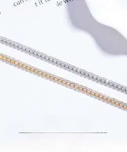 Detail view of silver and gold tennis bracelets featuring round brilliant pavé stones
