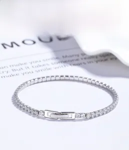 Detail of 925 sterling silver tennis bracelet with layered plating and zircon stones