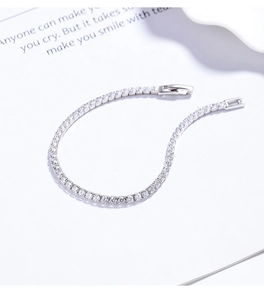 Detail of 925 sterling silver tennis bracelet with cubic zirconia in a single row design