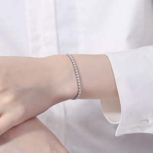 Elegant 925 sterling silver tennis bracelet with sparkling zircon stones on female wrist